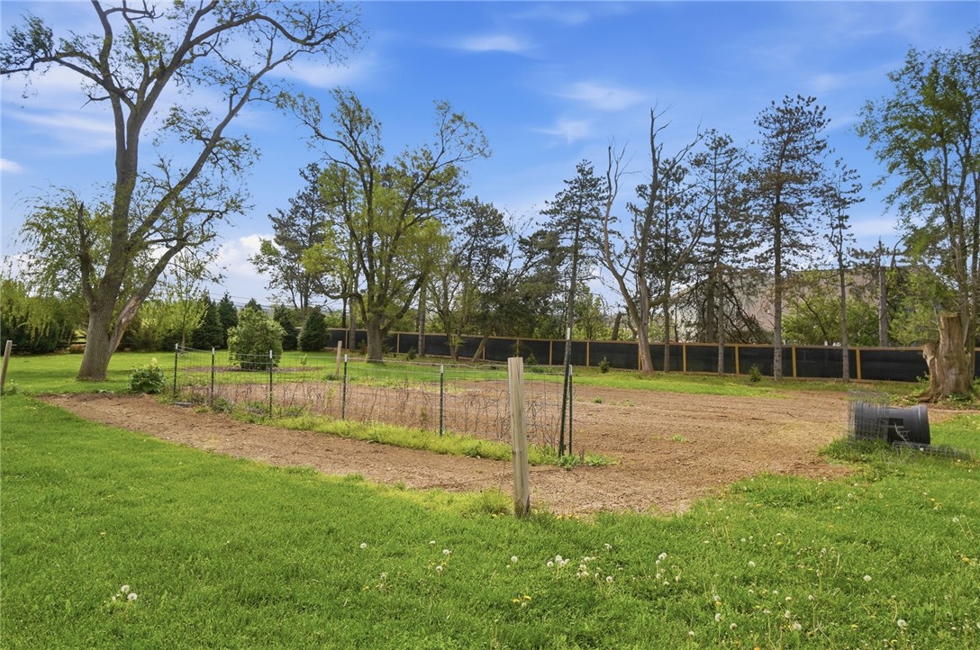 6155 North Union Road Clayton, OH 45315 - Photo 55 of 59 Expansive outdoor space offering lush greenery and mature trees under a vast sky.