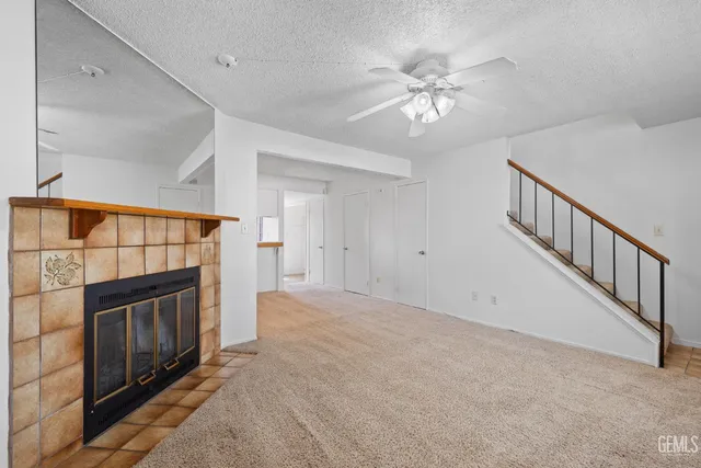 a view of kitchen and livingroom with chandelier