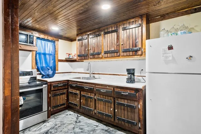 a bedroom with a bed and a cabinets