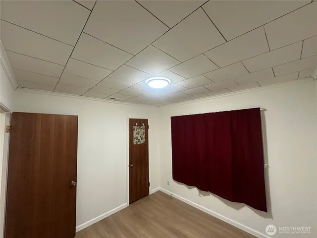 a bathroom with a toilet and shower