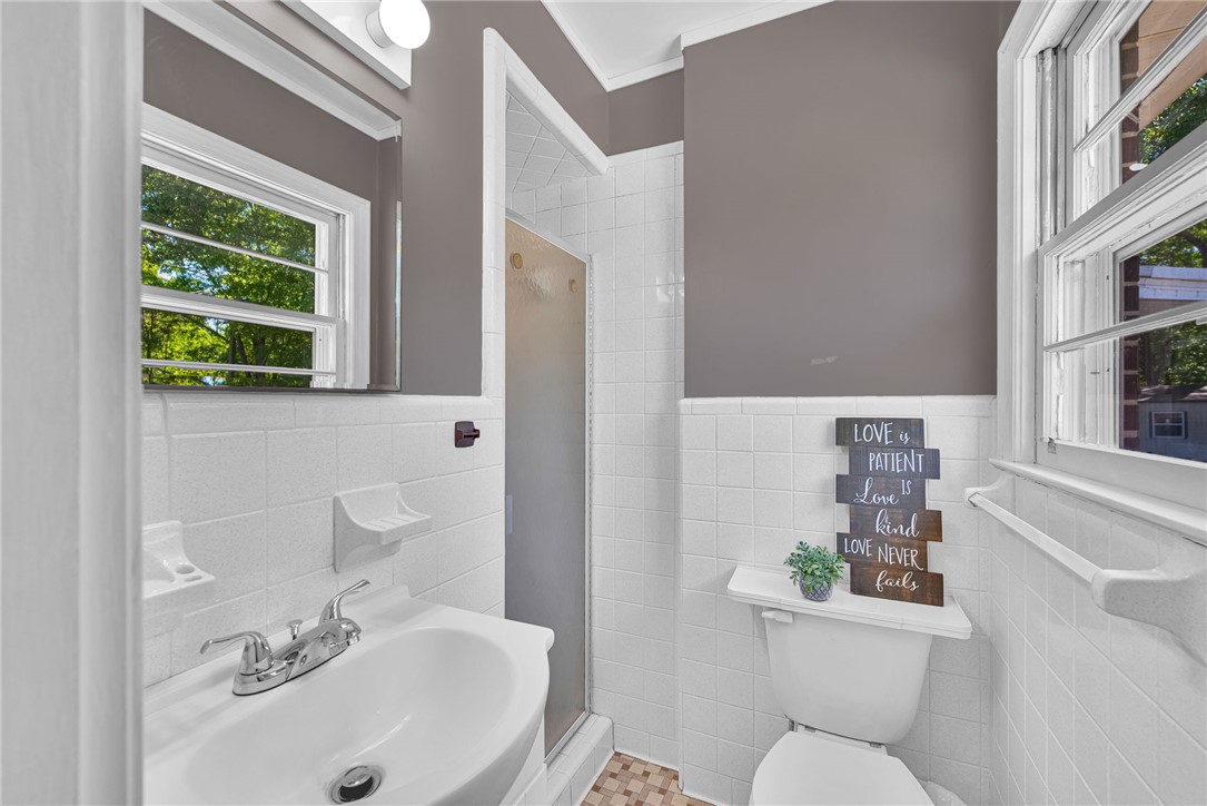 301 Clinkscales Street Iva, SC 29655 - Photo 16 of 36 This bathroom provides a refreshing and functional space for daily routines.