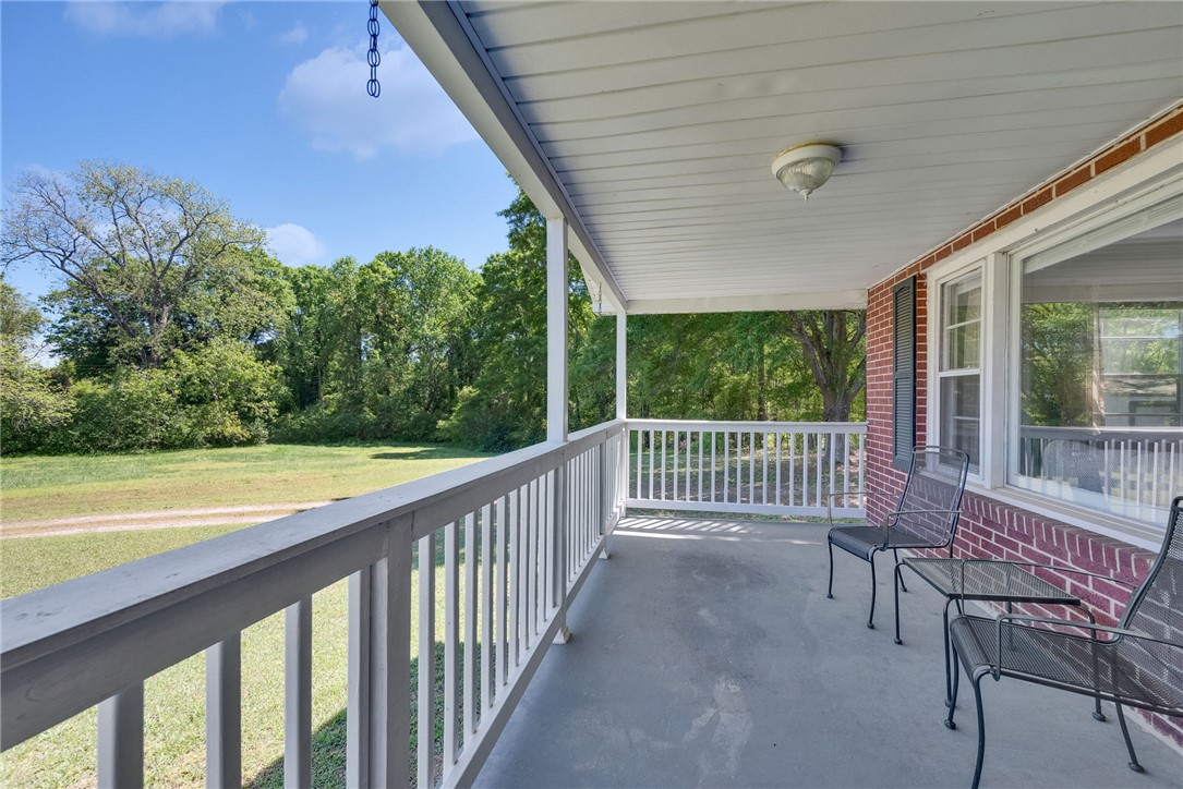 301 Clinkscales Street Iva, SC 29655 - Photo 2 of 36 Relax on this charming covered porch overlooking a spacious yard.