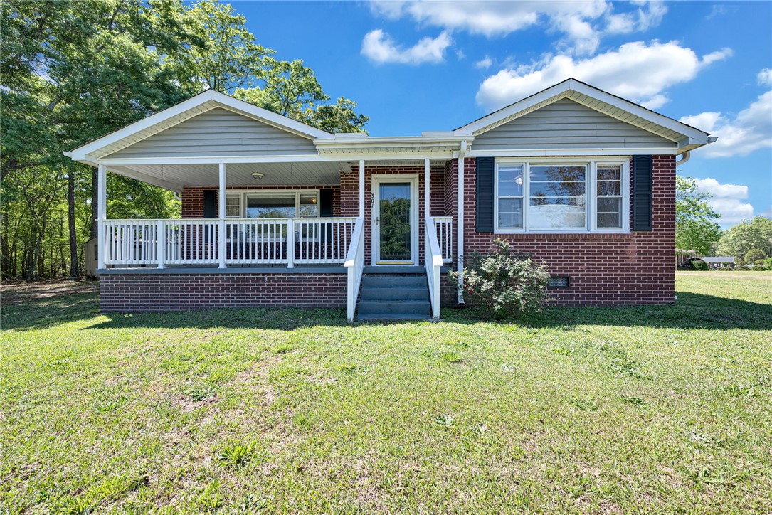 301 Clinkscales Street Iva, SC 29655 - Photo 30 of 36 This charming home offers a welcoming front porch, perfect for relaxing.