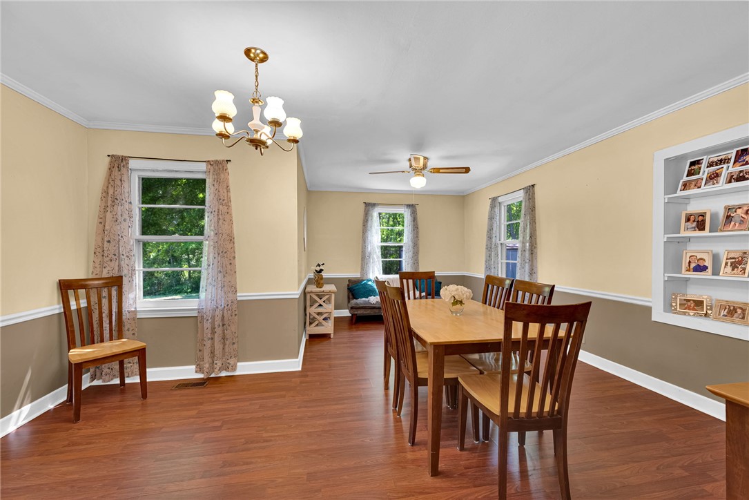 301 Clinkscales Street Iva, SC 29655 - Photo 6 of 36 This inviting dining area features ample natural light and seamless flow.