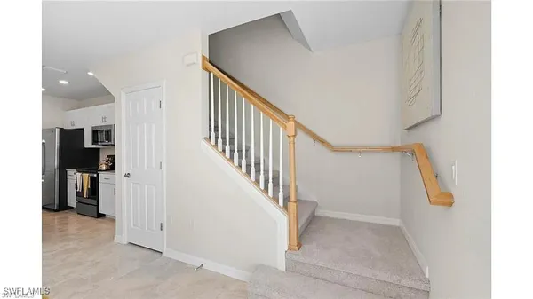 a view of hallway with stairs