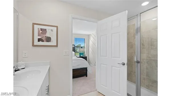 a bathroom with a tub and a shower