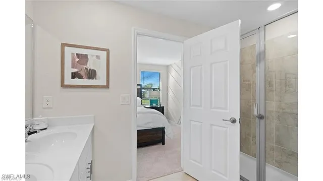 a bathroom with a tub and a shower