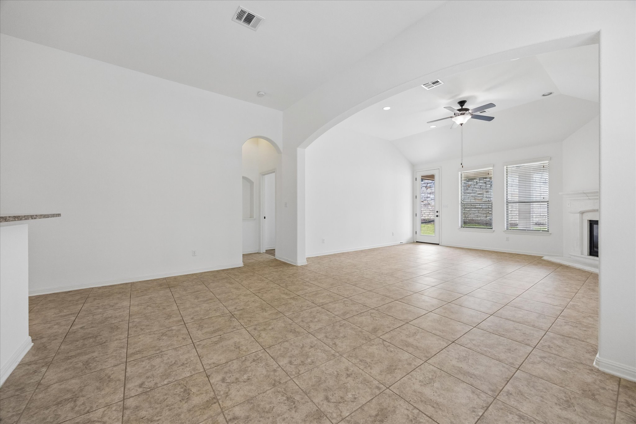 14304 Senia Bend Austin, TX 78738 - Photo 4 of 15 Spacious living area with vaulted ceilings that feels open and airy