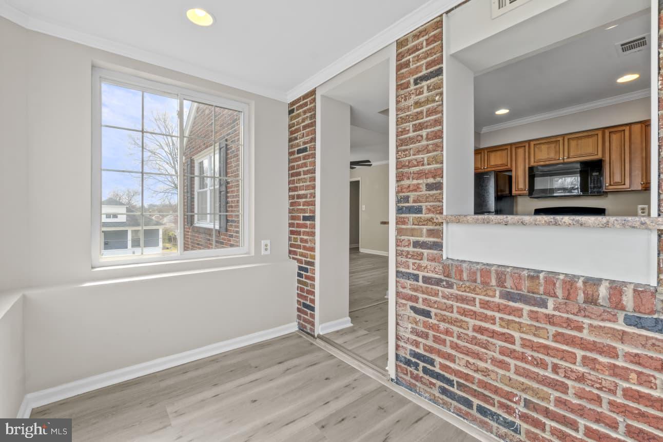 2528 Wendover Road, Unit B Baltimore, MD 21234 - Photo 8 of 22 Bright, airy space with brick accents.