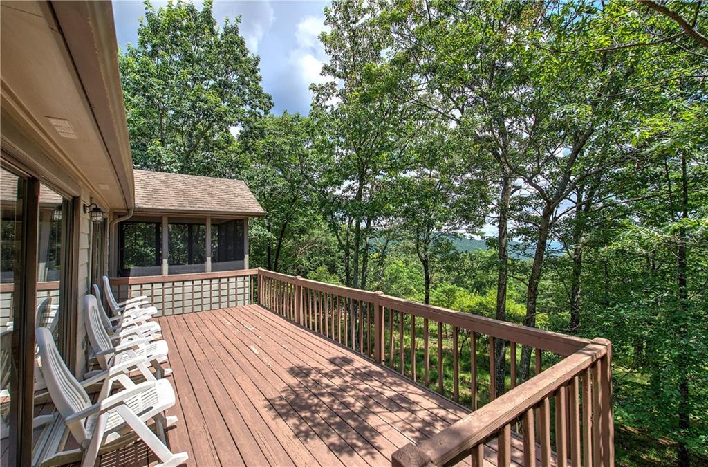1379 Little Hendricks Mountain Road Jasper, GA 30143 - Photo 15 of 56 a view of balcony with wooden deck and outdoor seating