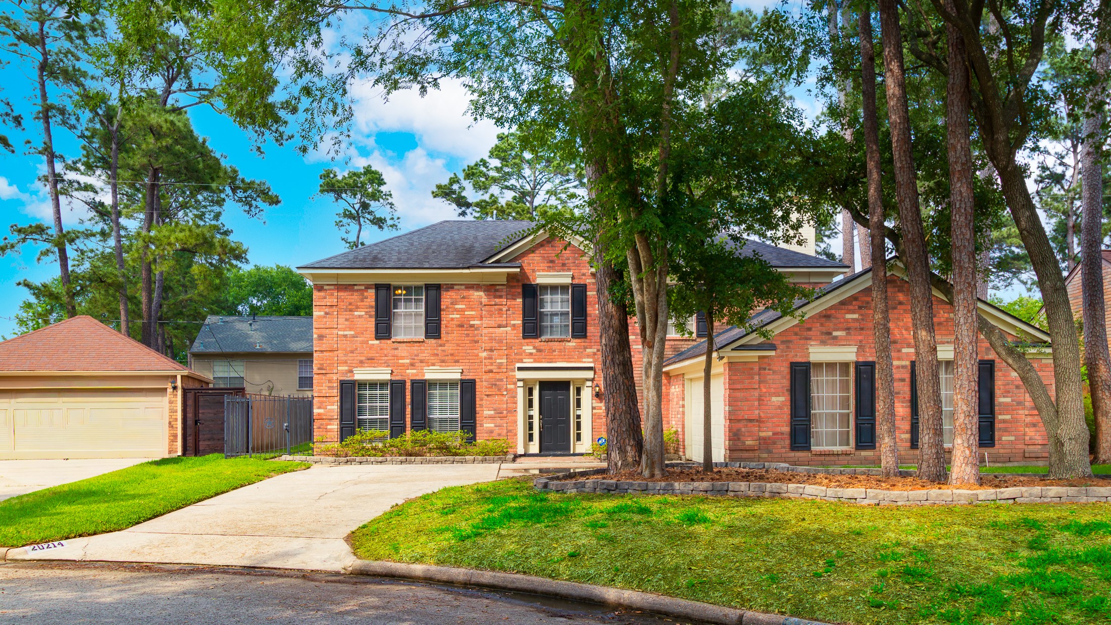 20214 Woodsboro Court Spring, TX 77388 - Photo 2 of 50 GORGEOUS 4 BEDROOM HOME IN THE OAKS OF DEVONSHIRE! LENNOX 17 SEER AC in 2018! TANKLESS WATER HEATER in 2025! WHOLE HOUSE EPOXY TREATMENT OF PLUMBING SYSTEM!