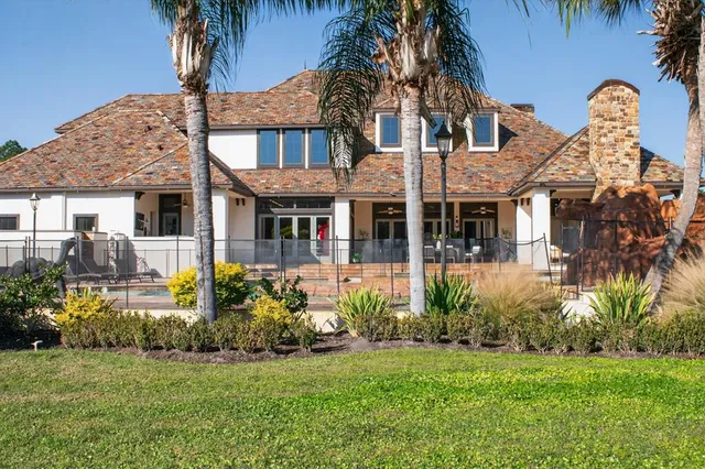 a view of a house with a big yard