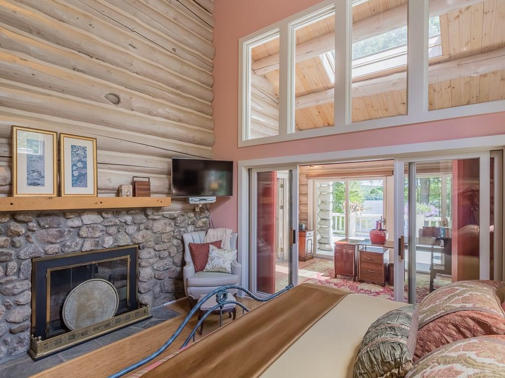 173 Malcolm Road Bridgton, ME 04009 - Photo 14 of 35 Wood burning fireplace in the master...