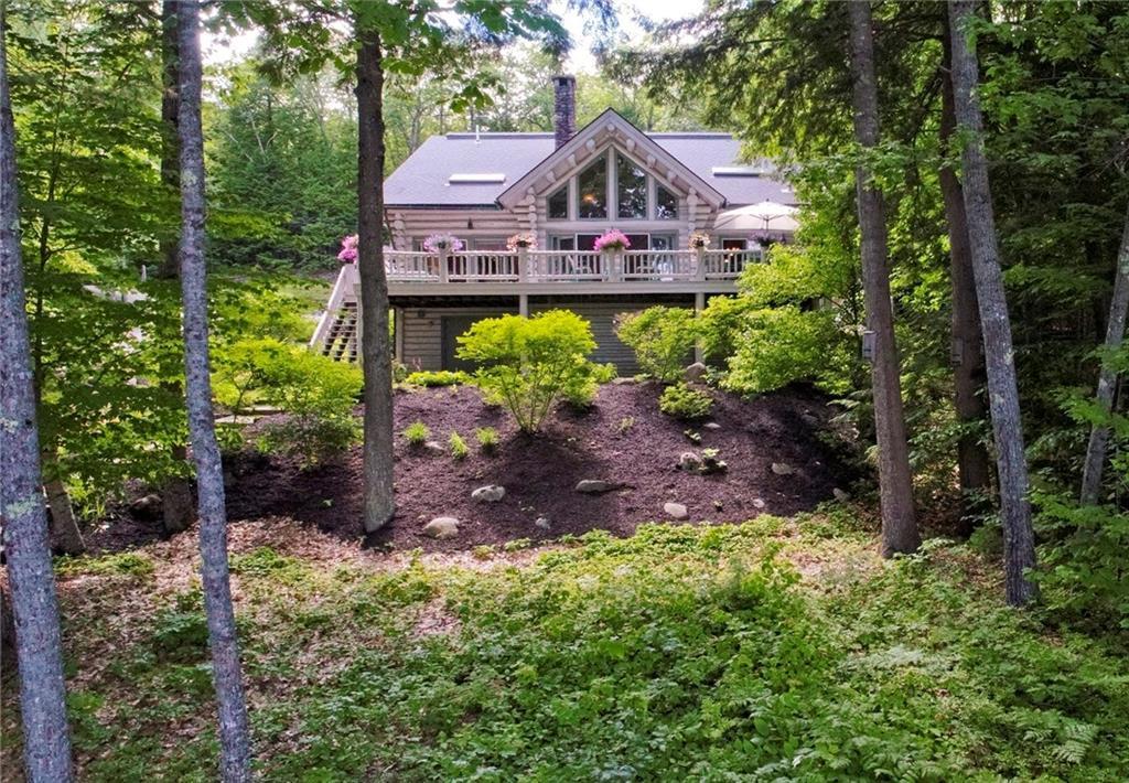 173 Malcolm Road Bridgton, ME 04009 - Photo 30 of 35 exterior of house facing the water.