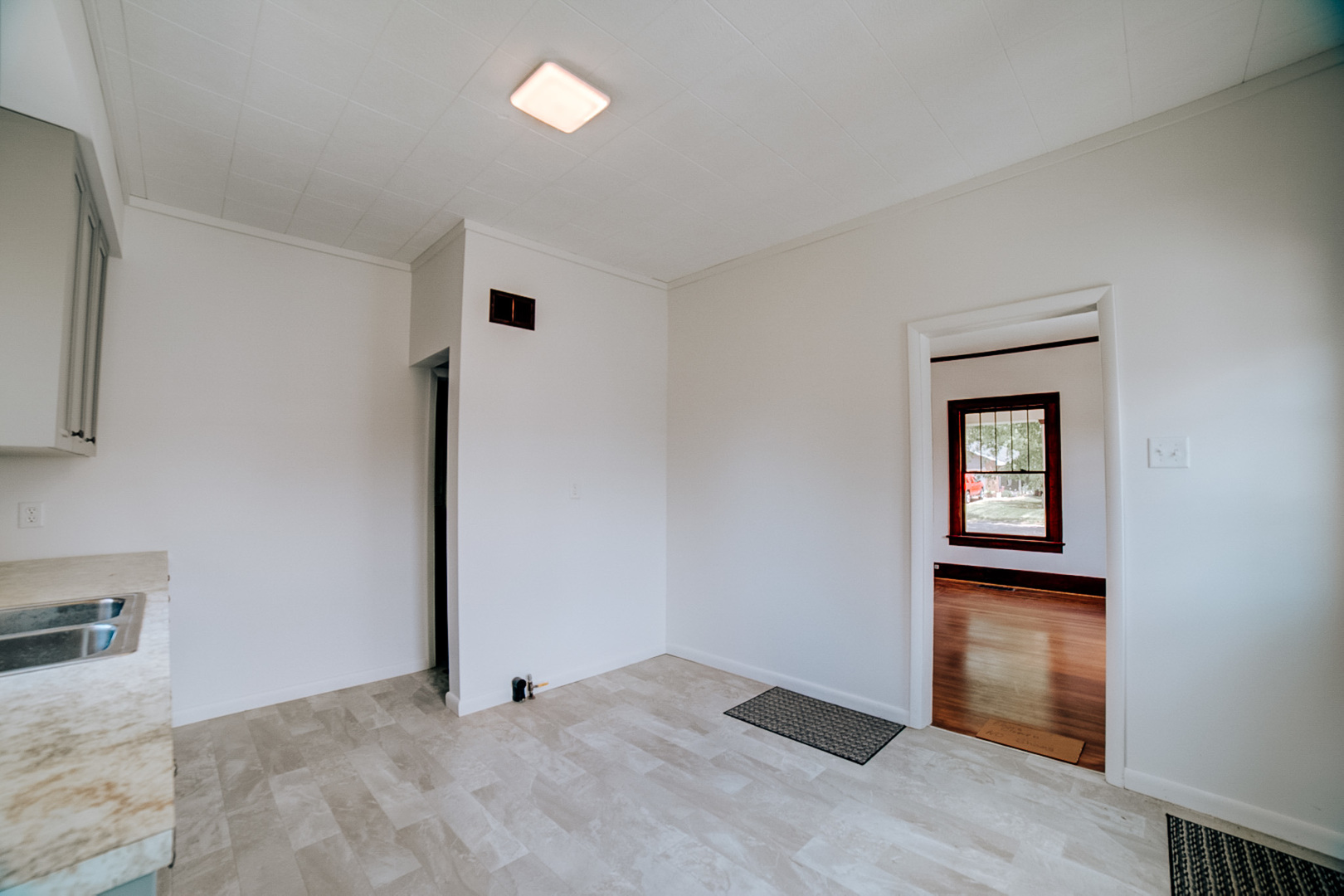 618 South Thomas Street Gilman, IL 60938 - Photo 23 of 38 an empty room with closet and mirror