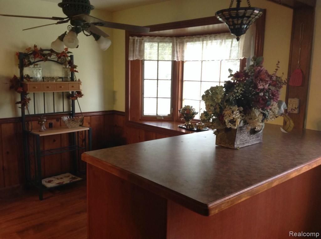 6147 Willis Road North Branch, MI 48461 - Photo 8 of 41 Breakfast Nook with Bar and Tiffany Lamp