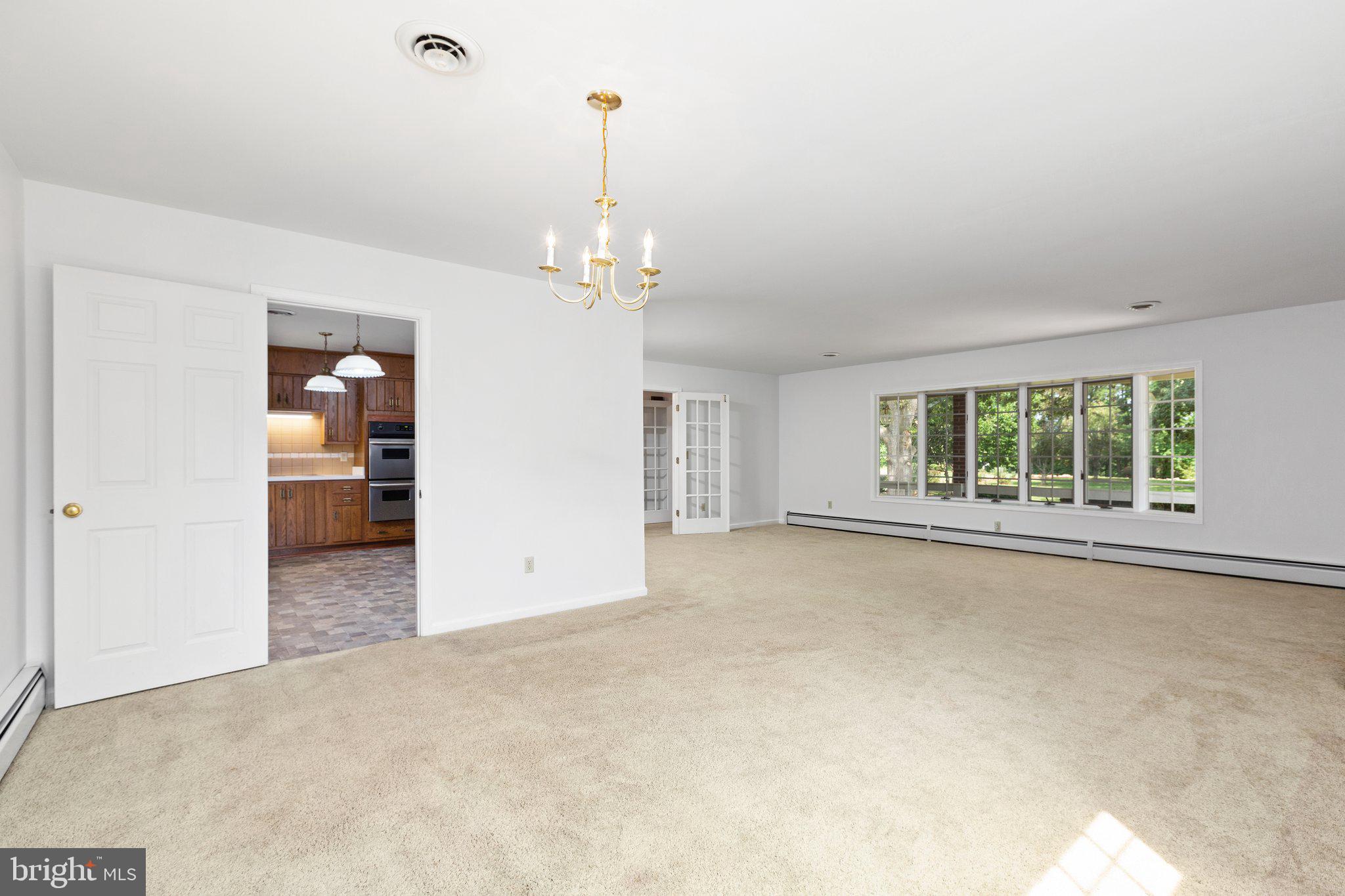 71 Cosner Road Louisa, VA 23093 - Photo 15 of 82 View from Dining Room into Living Room and Kitchen
