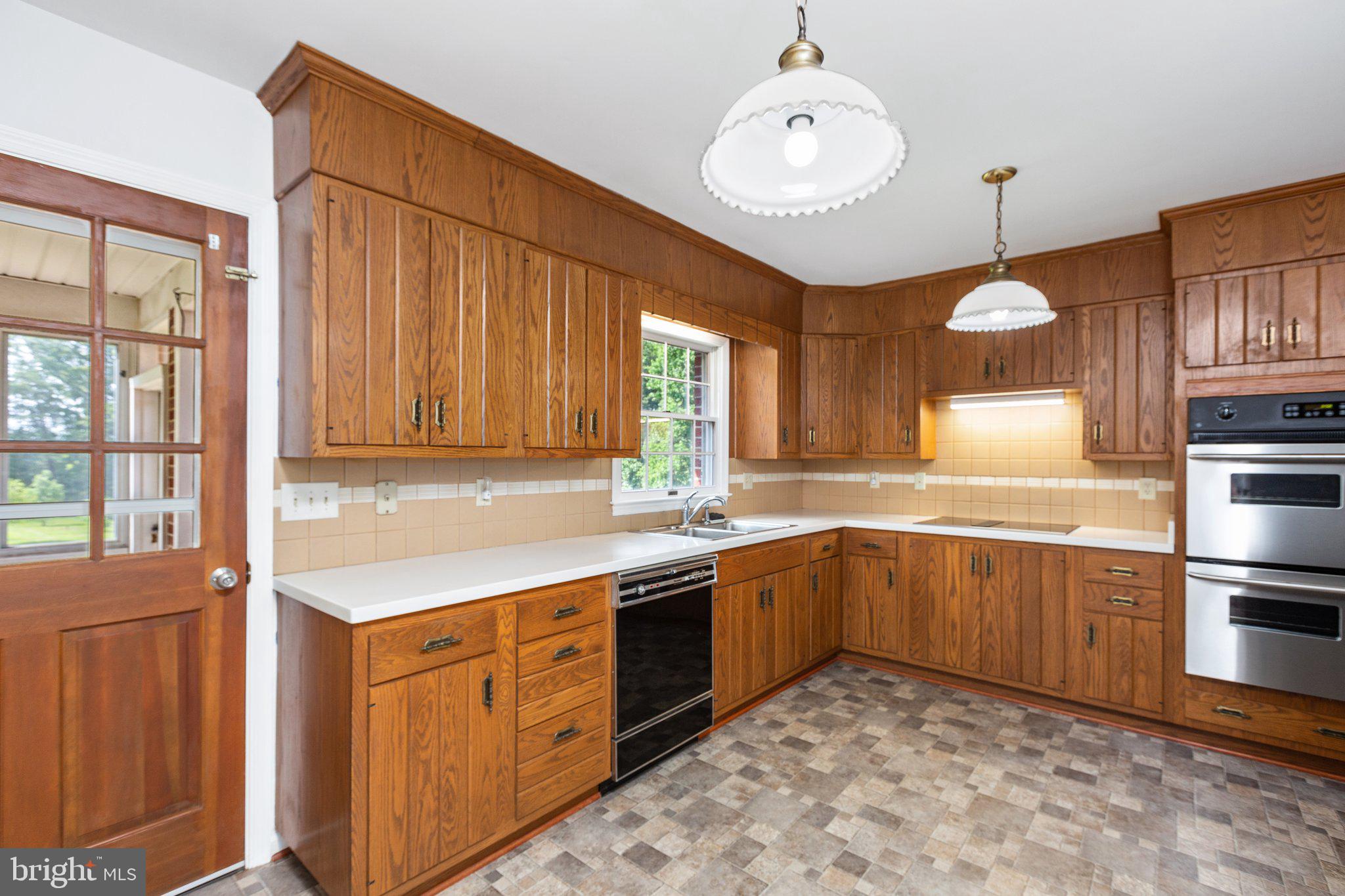 71 Cosner Road Louisa, VA 23093 - Photo 17 of 82 Kitchen with outdoor access to enclosed Sunroom