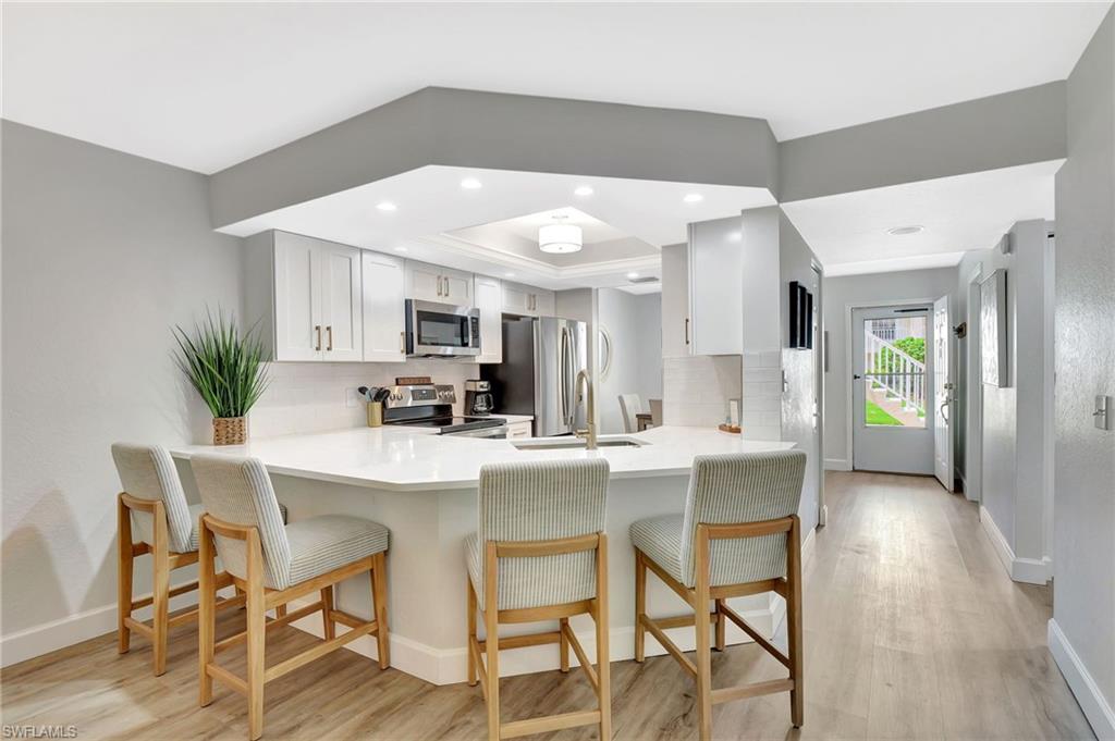 773 Wiggins Lake Drive, Unit 101 Naples, FL 34110 - Photo 3 of 40