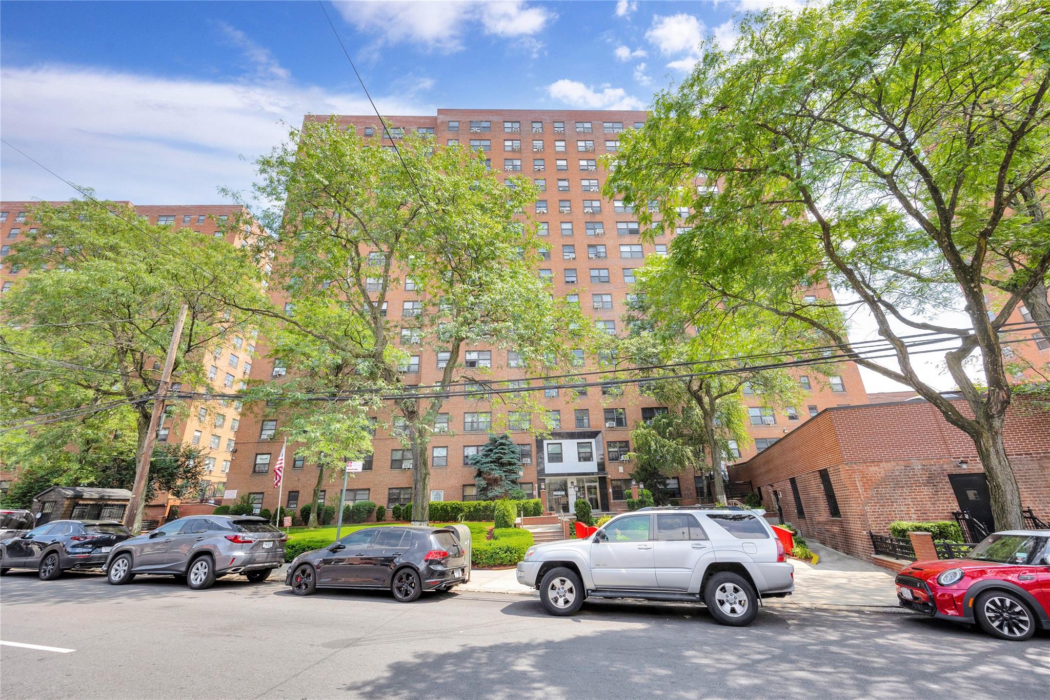 99-40 63rd Road, Unit 9Z Queens, NY 11374 - Photo 2 of 21 View of apartment building / complex