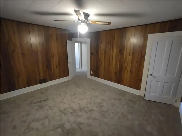 an empty room with a hallway