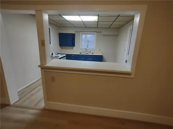 a view of a hallway with workspace