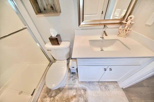 a spacious bathroom with a tub and a shower