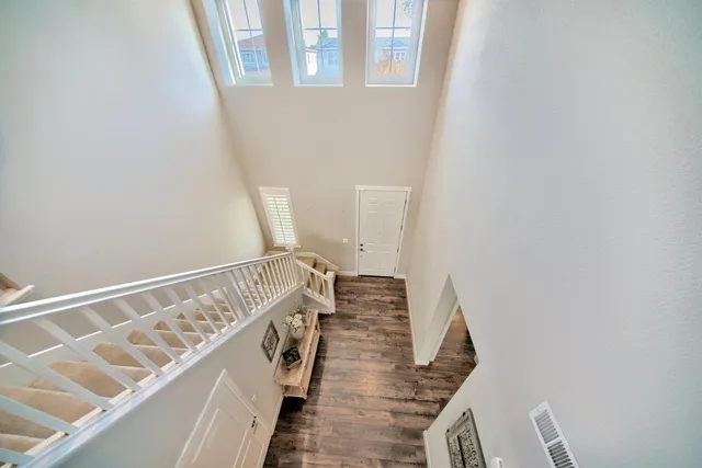 a bathroom with double sink and a mirror