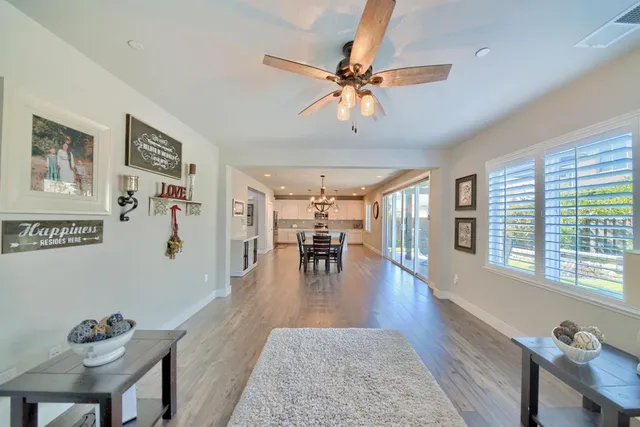 a kitchen with a table and chairs in it