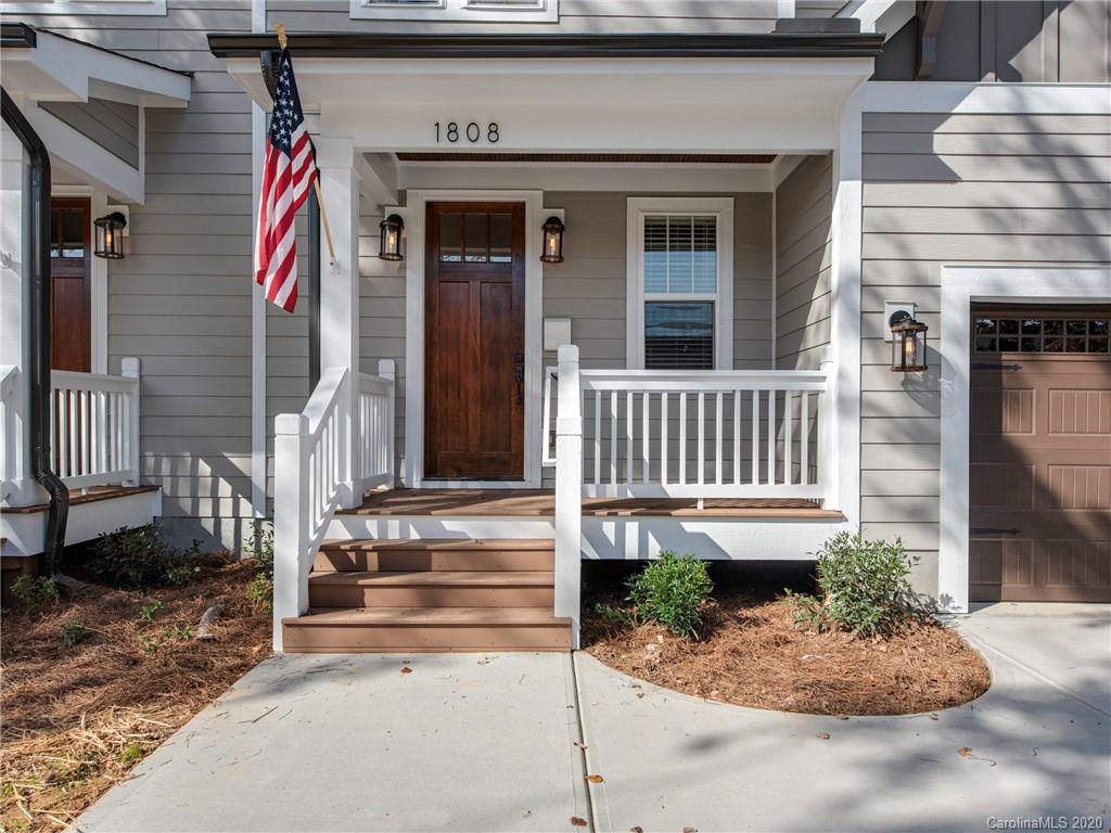 1808 Berryhill Road Charlotte, NC 28208 - Photo 2 of 34 a view of small house with potted plants
