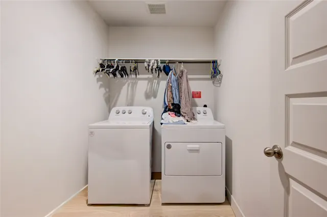 a view of hallway with wooden floor