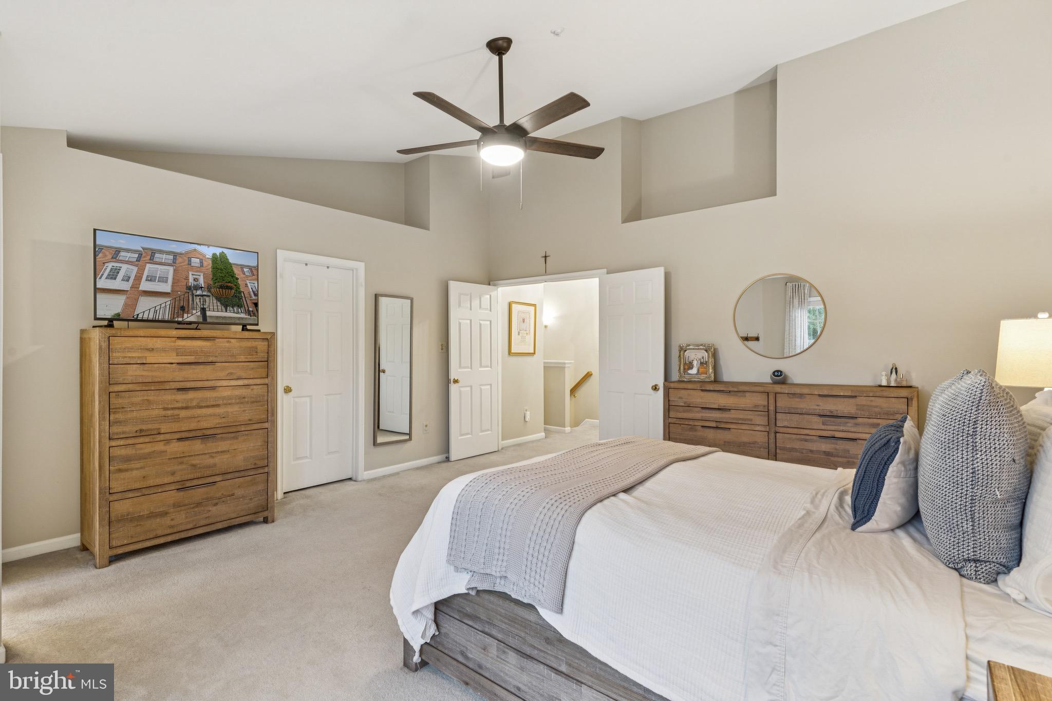 3844 Glebe Meadow Way Edgewater, MD 21037 - Photo 15 of 20 a bedroom with a bed and a chandelier