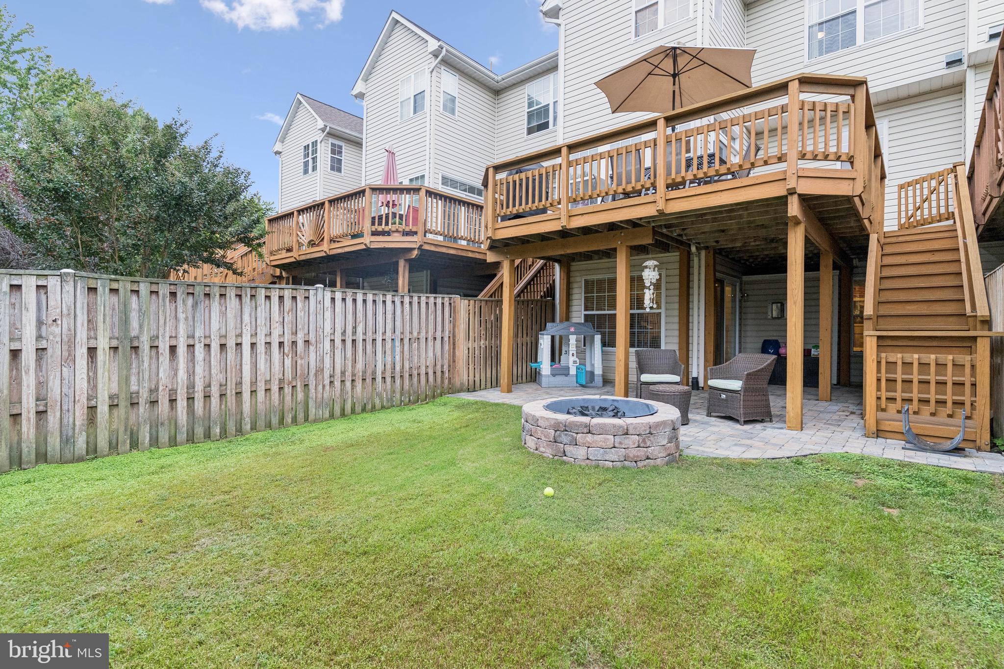3844 Glebe Meadow Way Edgewater, MD 21037 - Photo 19 of 20 a front view of a house with garden