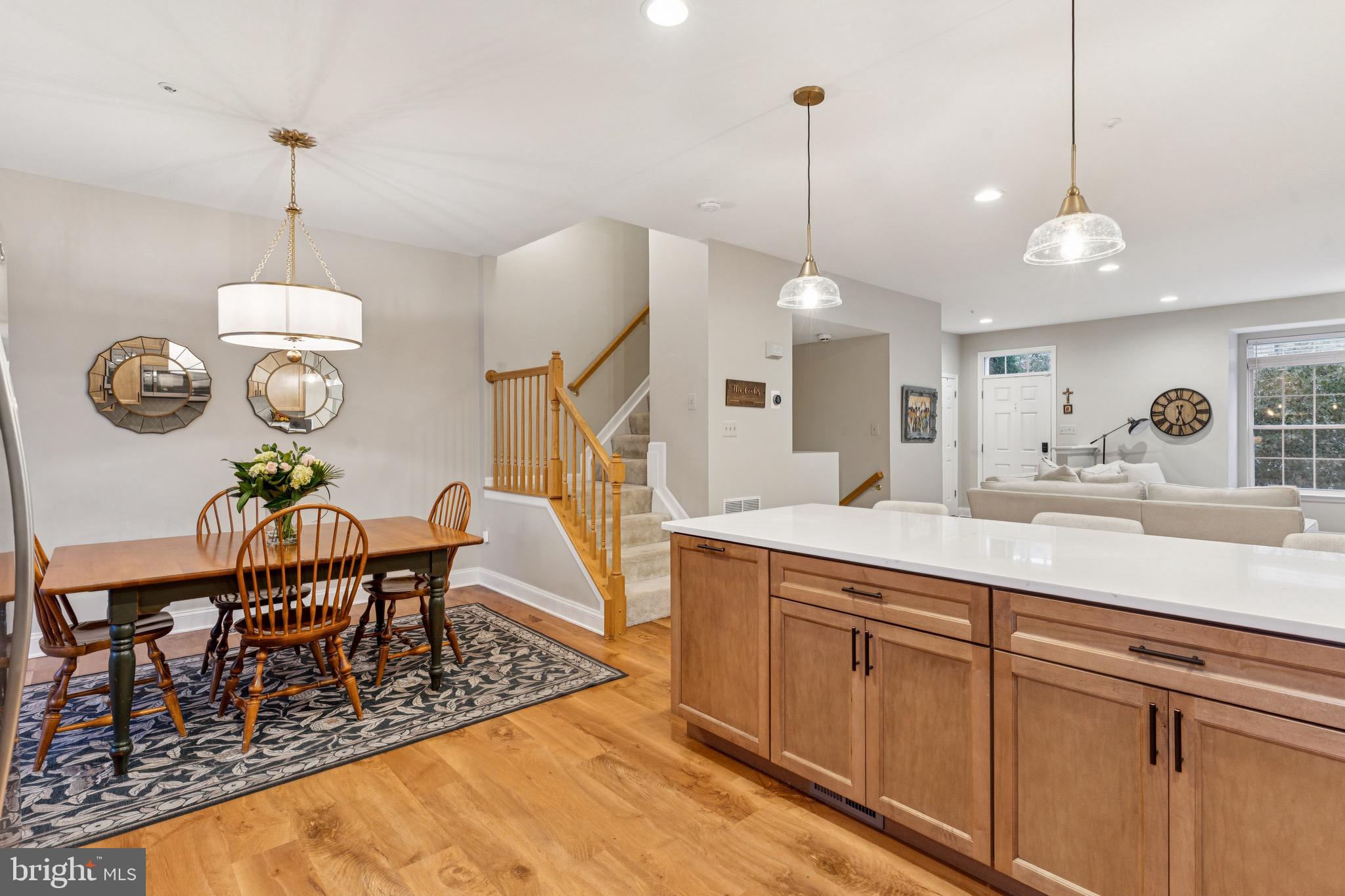 3844 Glebe Meadow Way Edgewater, MD 21037 - Photo 6 of 20 a view of a center island and dining table