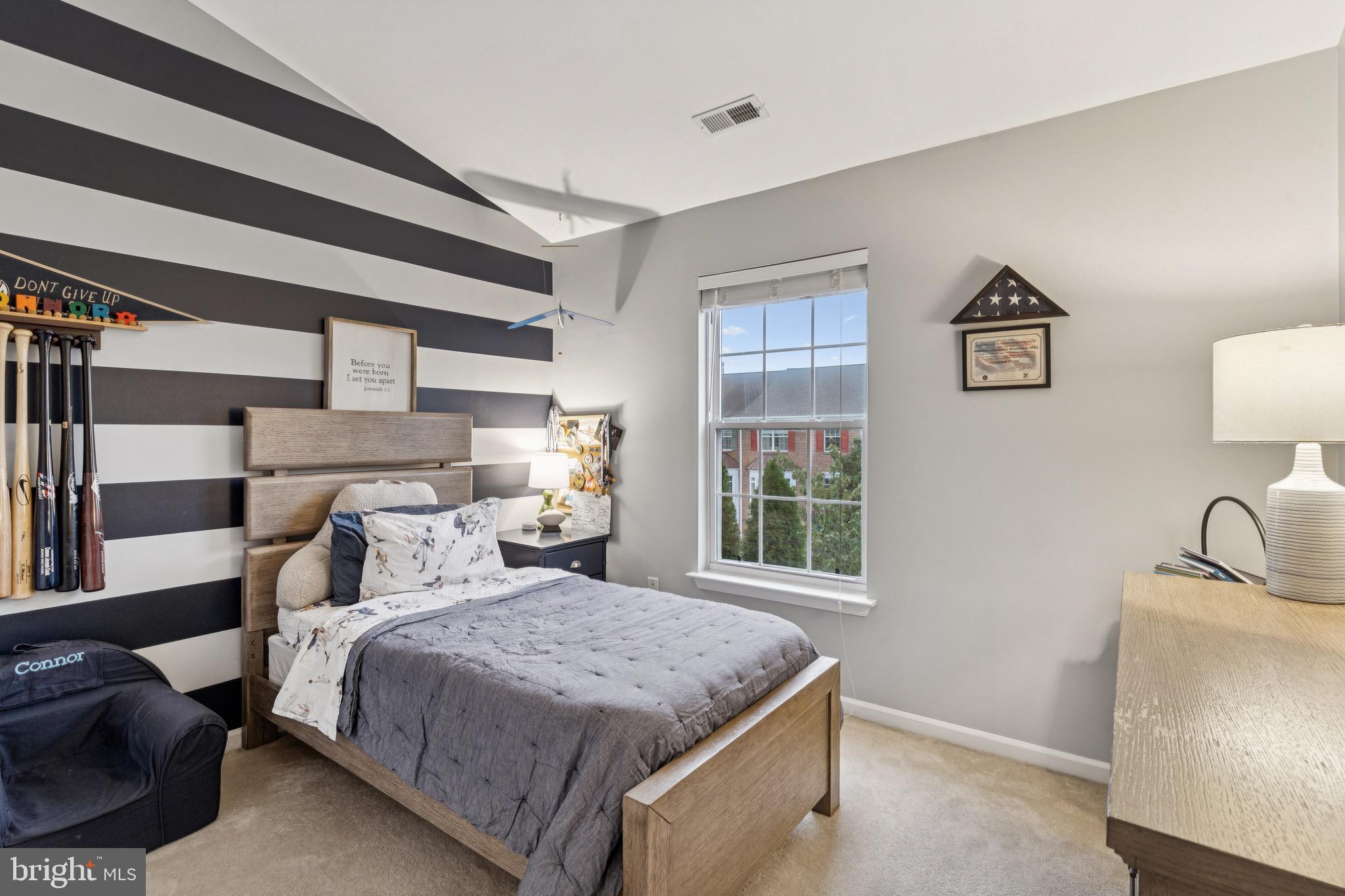 3844 Glebe Meadow Way Edgewater, MD 21037 - Photo 10 of 20 a bedroom with a bed and a window