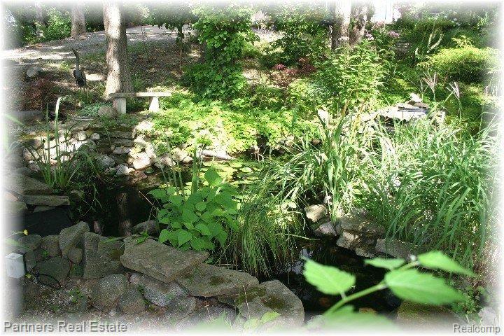2541 Spruce Ridge Howell, MI 48855 - Photo 23 of 24 Landscaped Pond
