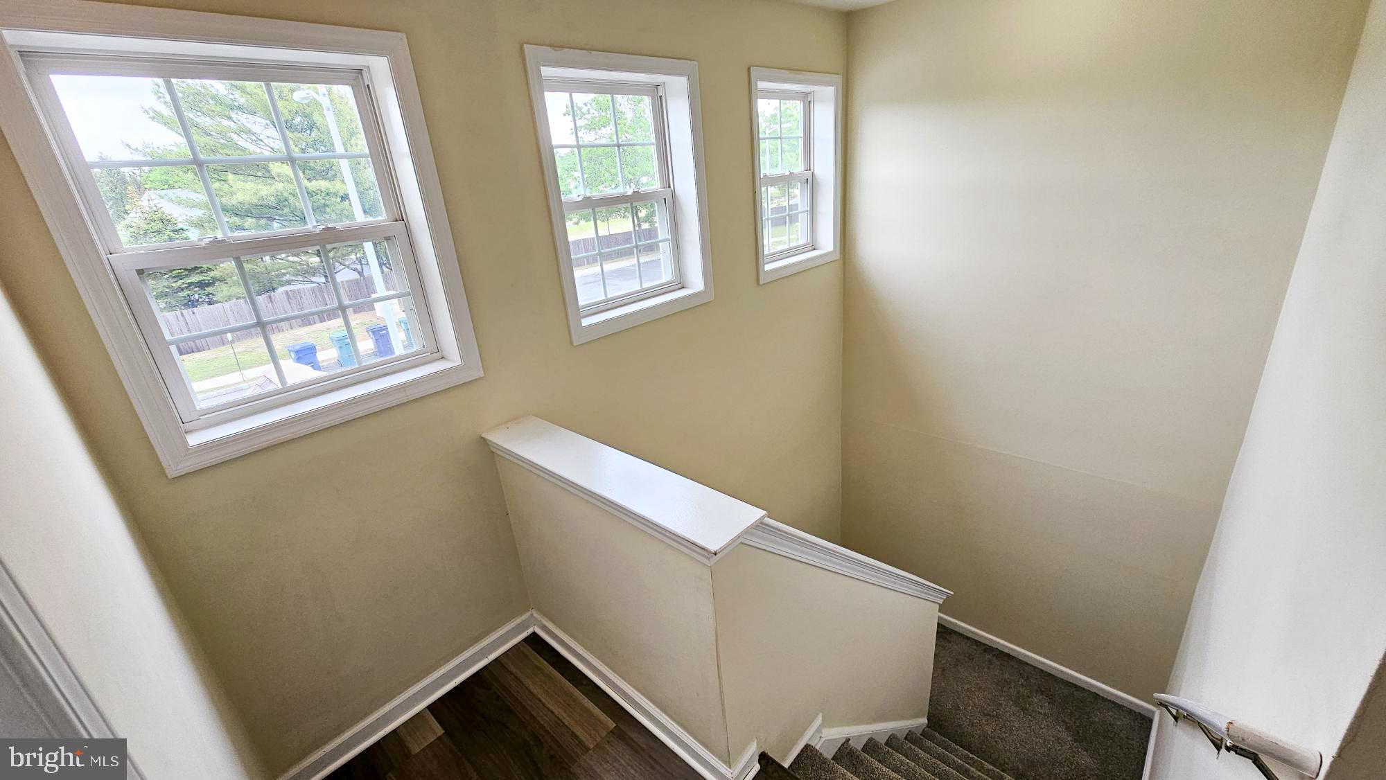 380 Radio Road, Unit B 6 Little Egg Harbor, NJ 08087 - Photo 17 of 33 a view of an empty room with windows