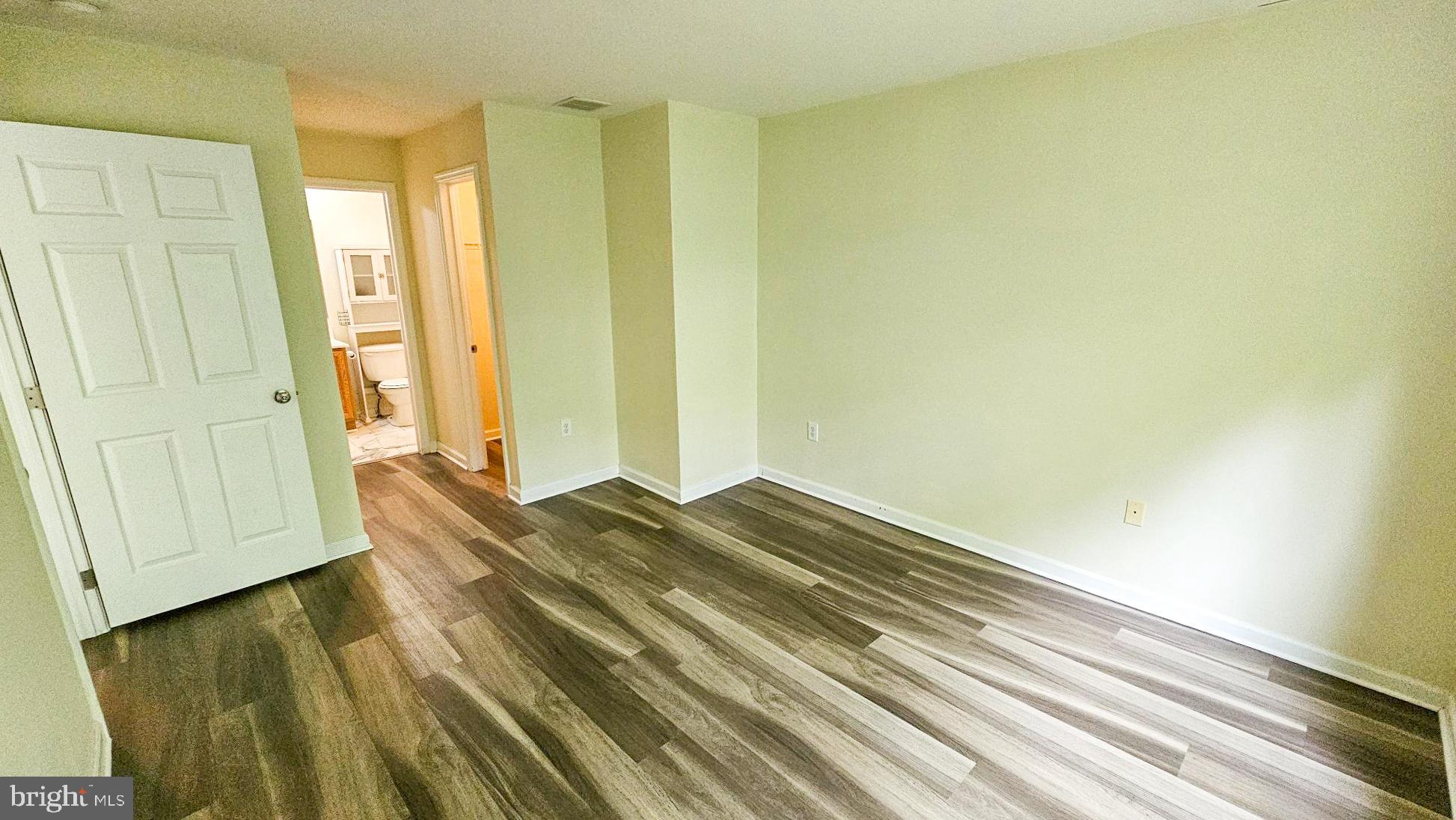 380 Radio Road, Unit B 6 Little Egg Harbor, NJ 08087 - Photo 26 of 33 a view of room and wooden floor