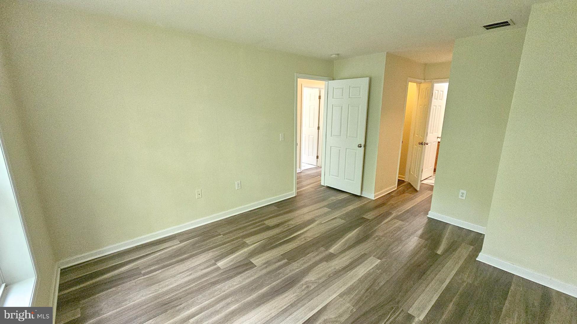 380 Radio Road, Unit B 6 Little Egg Harbor, NJ 08087 - Photo 27 of 33 a view of a room with wooden floor and bathroom