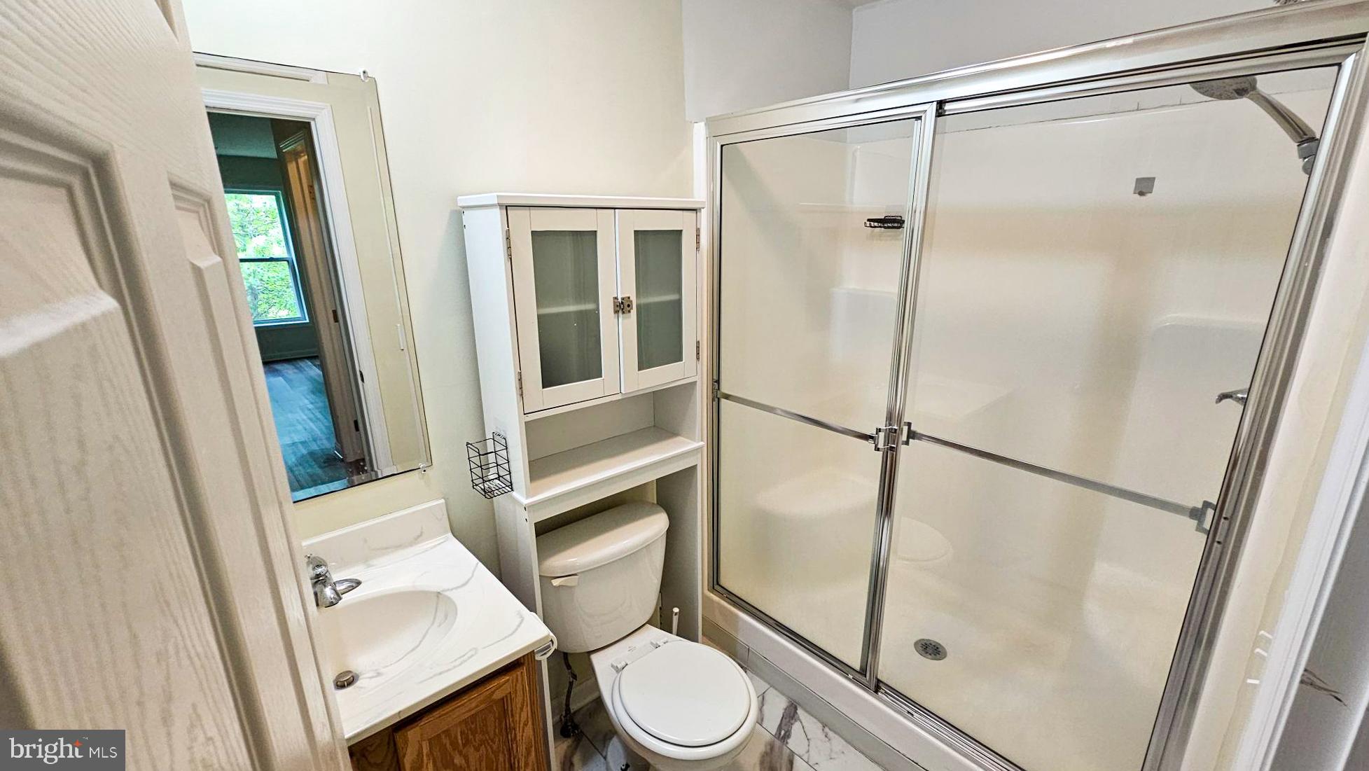 380 Radio Road, Unit B 6 Little Egg Harbor, NJ 08087 - Photo 28 of 33 a bathroom with a toilet and a shower