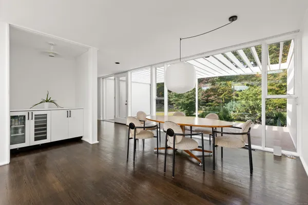 a kitchen with stainless steel appliances a sink and cabinets