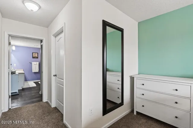 a bathroom with a sink double vanity and a mirror
