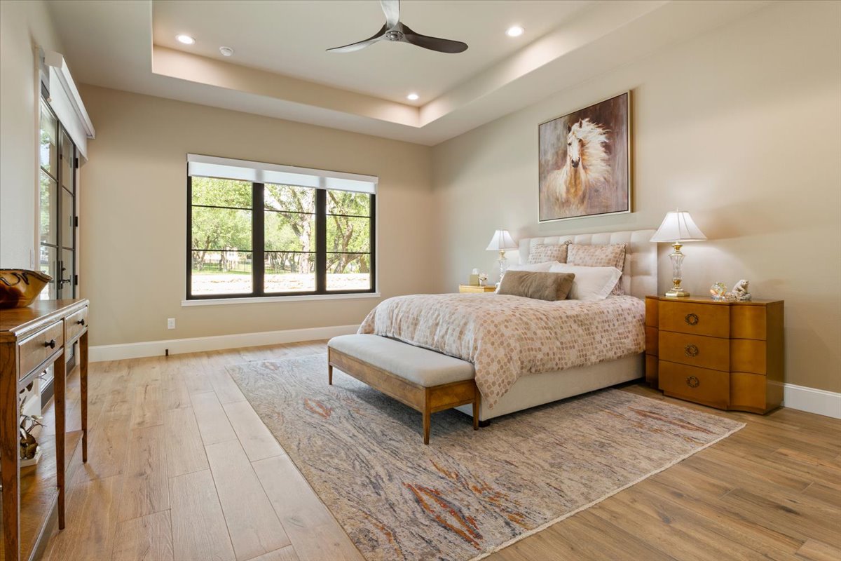 309 Highland Spring Lane Georgetown, TX 78633 - Photo 20 of 40 Clean and simple look...yet such a polished & perfect looked. Tray ceiling & recessed lighting. Sleep well, my friends...
