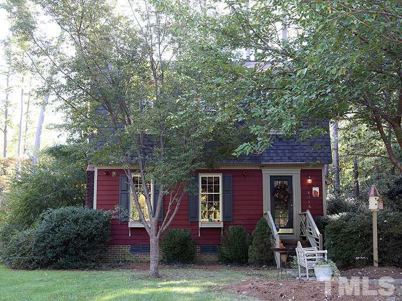 6216 Wynbrook Way Raleigh, NC 27612 - Photo 2 of 19 a front view of a house with garden