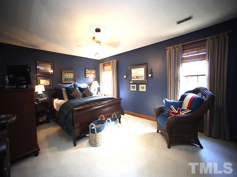 6216 Wynbrook Way Raleigh, NC 27612 - Photo 11 of 19 a living room with furniture and a window