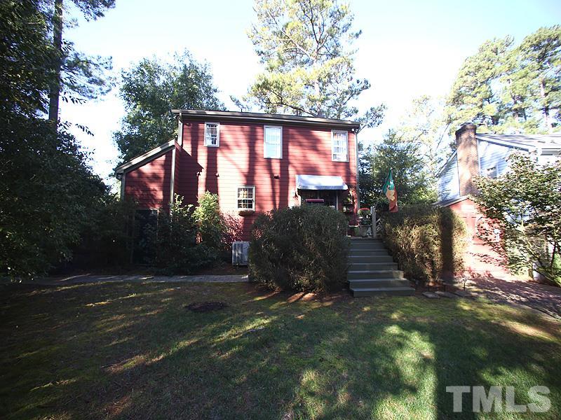 6216 Wynbrook Way Raleigh, NC 27612 - Photo 18 of 19 a view of a house with a yard