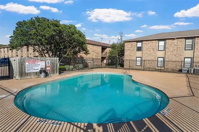 a view of a house with a swimming pool