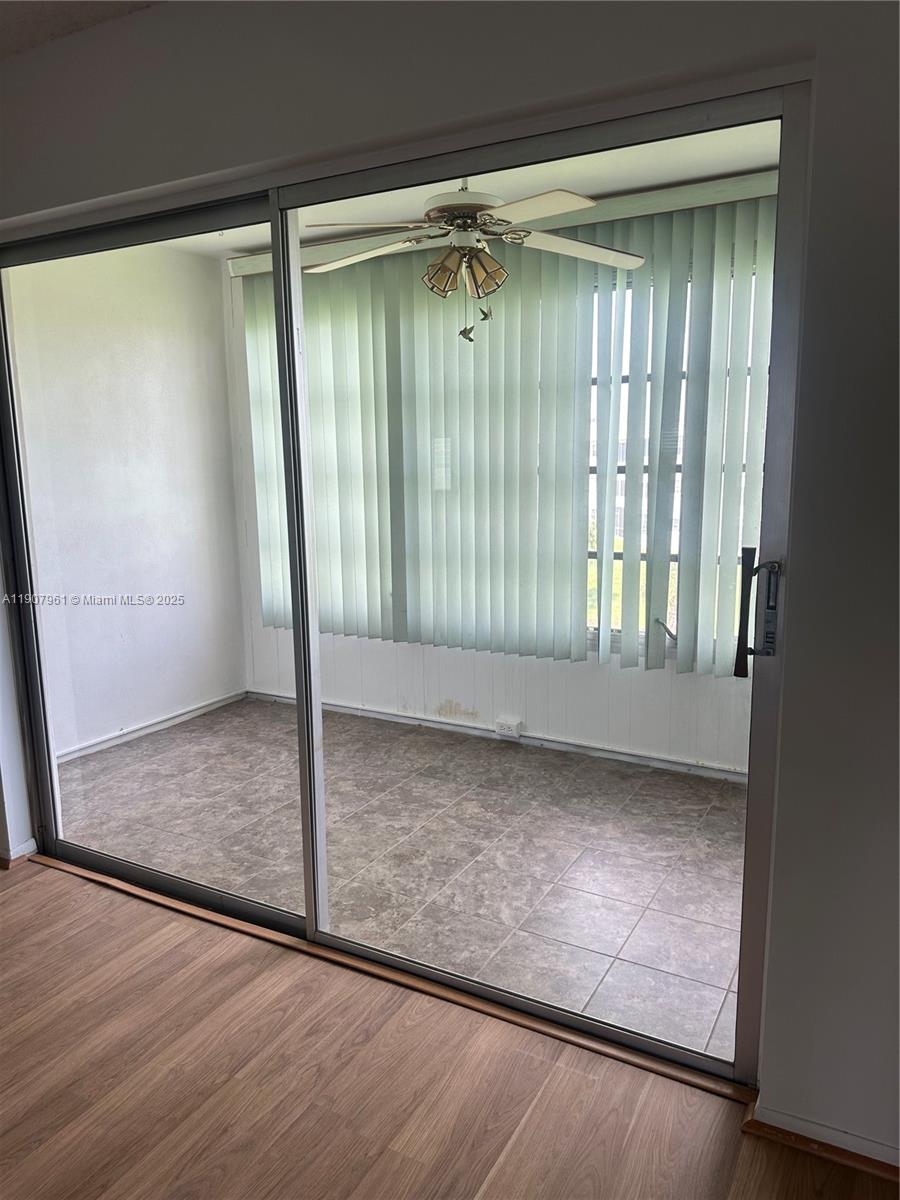 8110 Sunrise Lakes Boulevard, Unit 304 Sunrise, FL 33322 - Photo 2 of 9 a view of an empty room and window