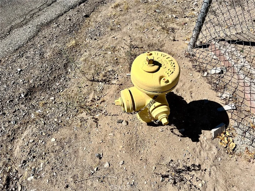 42424148 Armory Road Barstow, CA 92311 - Photo 18 of 22 a bathroom with a sink and a toilet