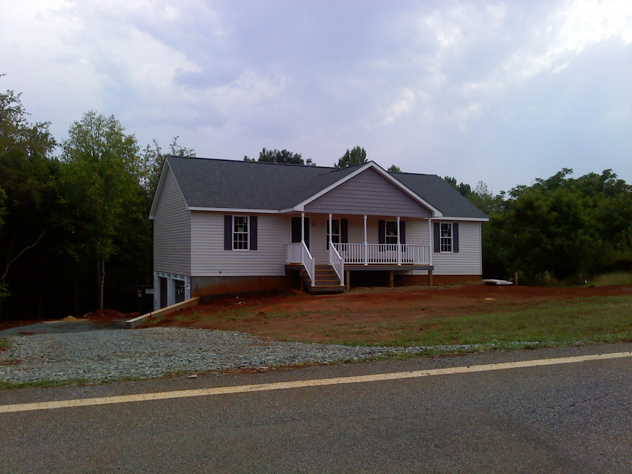 3 Goodview Road Goodview, VA 24095 - Photo 1 of 7 a front view of a house with a yard